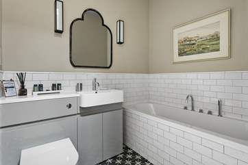 The luxurious bathroom is the perfect place to relax after a long day.
