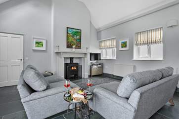 The luxurious woodburner keeps the living space nice and toasty.