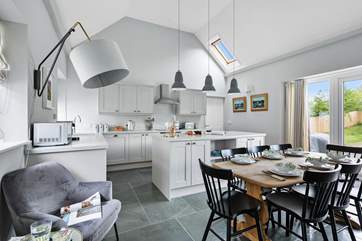 Welcome!
The dining-table sits centrally to the room and opposite the patio doors out onto the garden.