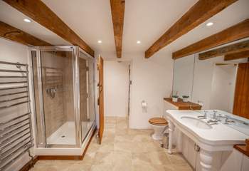 The main bathroom sits between both of the bedrooms on the ground level.