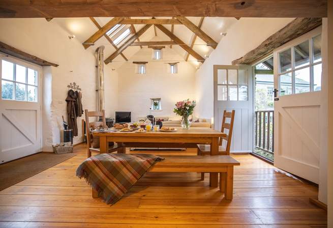 The joy of this room has to be the wonderful vaulted ceiling and large stable-doors that can be opened.