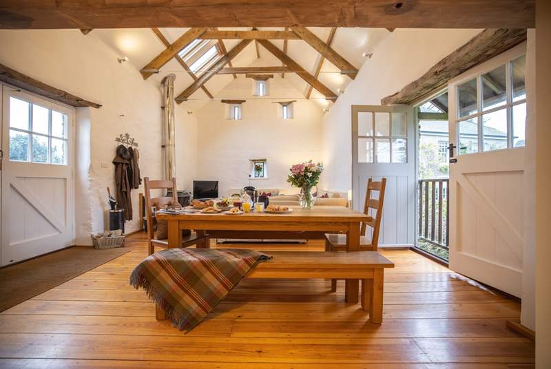 The joy of this room has to be the wonderful vaulted ceiling and large stable-doors that can be opened.