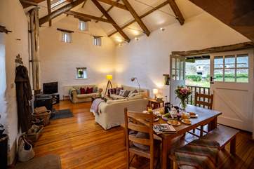 Open plan living at its very best. No detail has been overlooked, with wonderful furnishings, original features and that wonderful wood-burner. No matter the season, this space will be enjoyed by one and all.