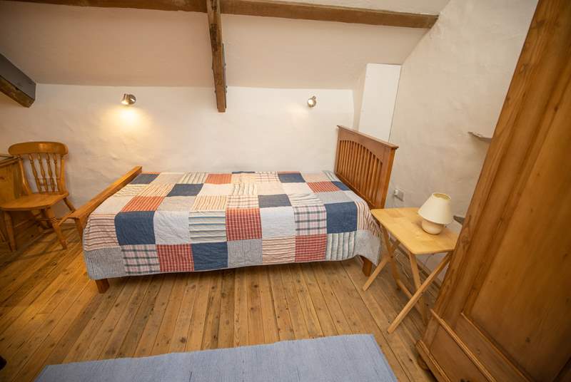 The mezzanine area has a single bed. Owing to it being a bed on the open mezzanine level this room would suit a teenager.  