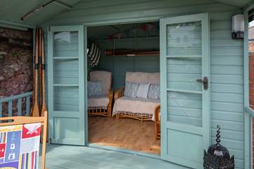 Snuggle up in the summer-house.