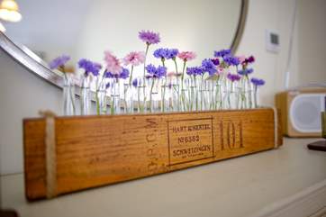 The bedroom benefits from lovely finishing touches including a digital radio in the bedroom.