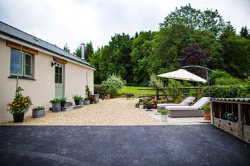 Your sun terrace will be enjoyed for hours, the tarmac area will be your unloading area with parking yards away in the side track. Please note, the area of lawn at the top of the photo is the owners and will be fenced off.