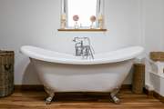 Relax in the roll-top bath - there is room for two.