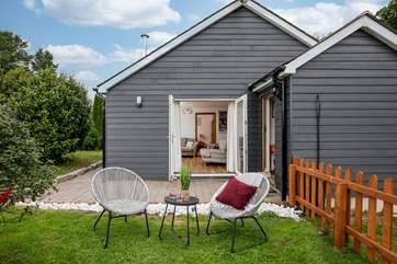 Sit and listen to the birdsong with a glass of wine in hand.