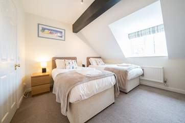 The first floor twin bedroom. (Please note there is restricted head height).