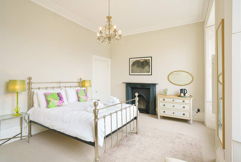 This gorgeous bedroom has views over Tenby town.