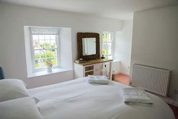 Bedroom 2 overlooks the garden and you can see the sea too!
