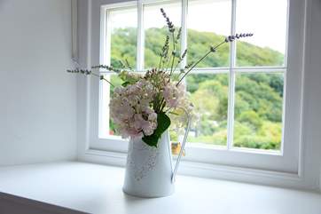 Pretty vases of wild flowers picked fresh from the garden at Bayview await you.