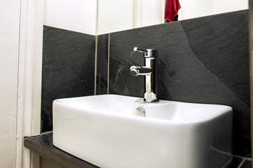 The shower-room sink is very charming.