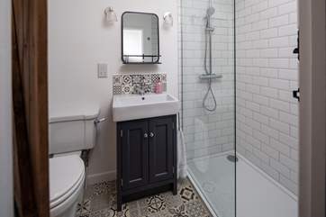 Modern and bright; this is the shower-room upstairs.