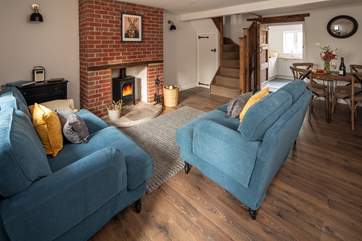 The beautifully furnished sitting/dining-room.