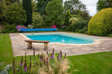Just imagine yourself sitting here! The outdoor pool is fully heated and open from May - September.