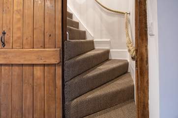 The staircase is a traditional Dorset winder which is quite steep and narrow but there is a rope handrail all the way up.