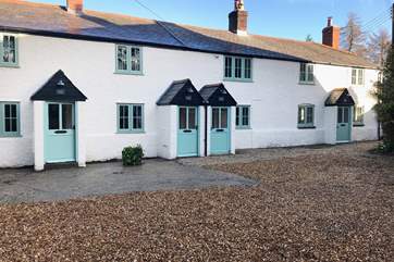 Woodcutter's Cottage is the third cottage from the left.