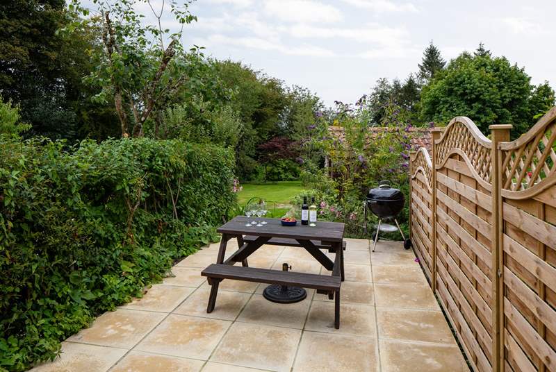 Your patio area is private and tucked away at the back of the cottage.