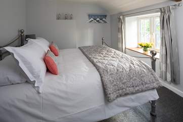 The second bedroom looks out over the front of the cottage.
