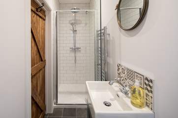 On the ground floor there is a handy shower-room.