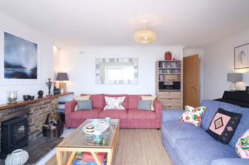 There are two comfortable sofas in the sitting-room.