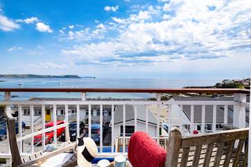 Sit on the balcony and watch the world go by.