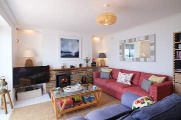 The cosy wood-burning stove makes this an ideal retreat all year round.