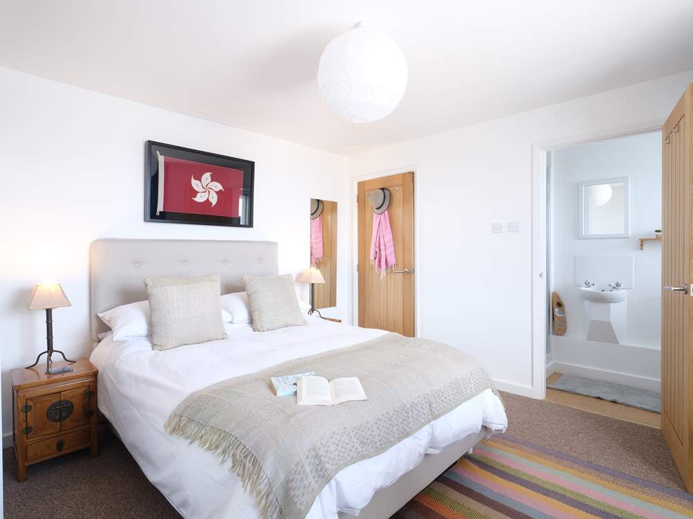 The main bedroom has an en suite shower-room.
