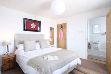 The main bedroom has an en suite shower-room.