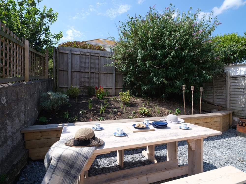 There are three choices for al fresco dining, the rear terrace gets the evening sun.