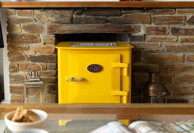 Even in those cooler months you can enjoy reading a book in front the cosy Everhot electric stove.