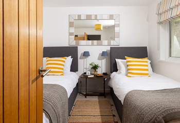 Bedroom 2 has twin beds.