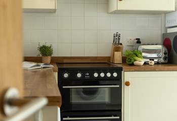 The kitchen has all you need to cook up a delicious meal. 