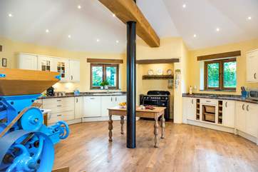 Located in the old mill, the octagonal shaped kitchen is totally unique.