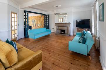 The sitting-room connects nicely through to the dining-room.