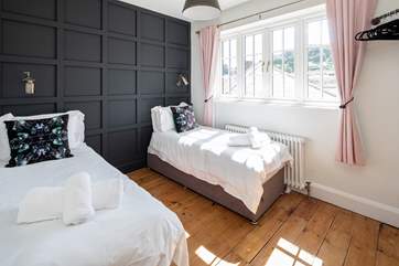 Bedroom four is home to a 'zip and link' super-king size bed, which transforms into these fabulous single beds.