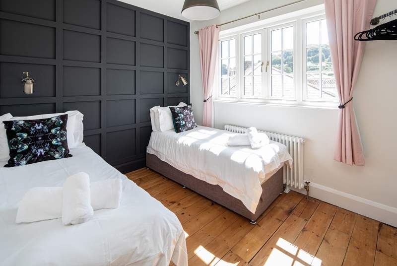 Bedroom four is home to a 'zip and link' super-king size bed, which transforms into these fabulous single beds.