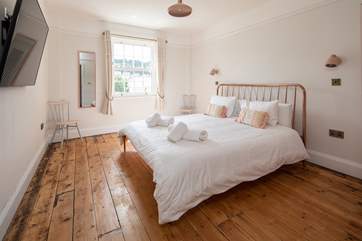 Bedroom two is super spacious and light and is home to this super-king size bed.