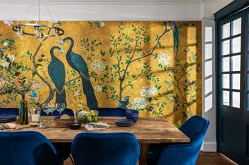 The dining area leads to the living room and the separate kitchen.