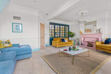 The sitting-room connects nicely through to the dining-room.
