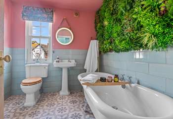 The family bathroom is home to this beautiful roll-top bath.