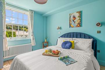 Bedroom two is light and inviting and is home to this super-king size bed.