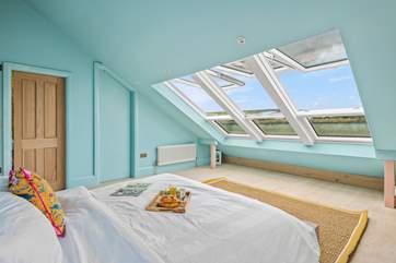 What a view to wake up to in the morning. Stunning views stretch over the wider landscape of Teignmouth's back beach, Shaldon bridge, and up across to Dartmoor.
