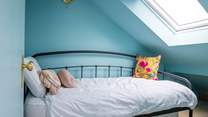 Bedroom 7 is accessed via bedroom 6 and is home to this cosy single bed.