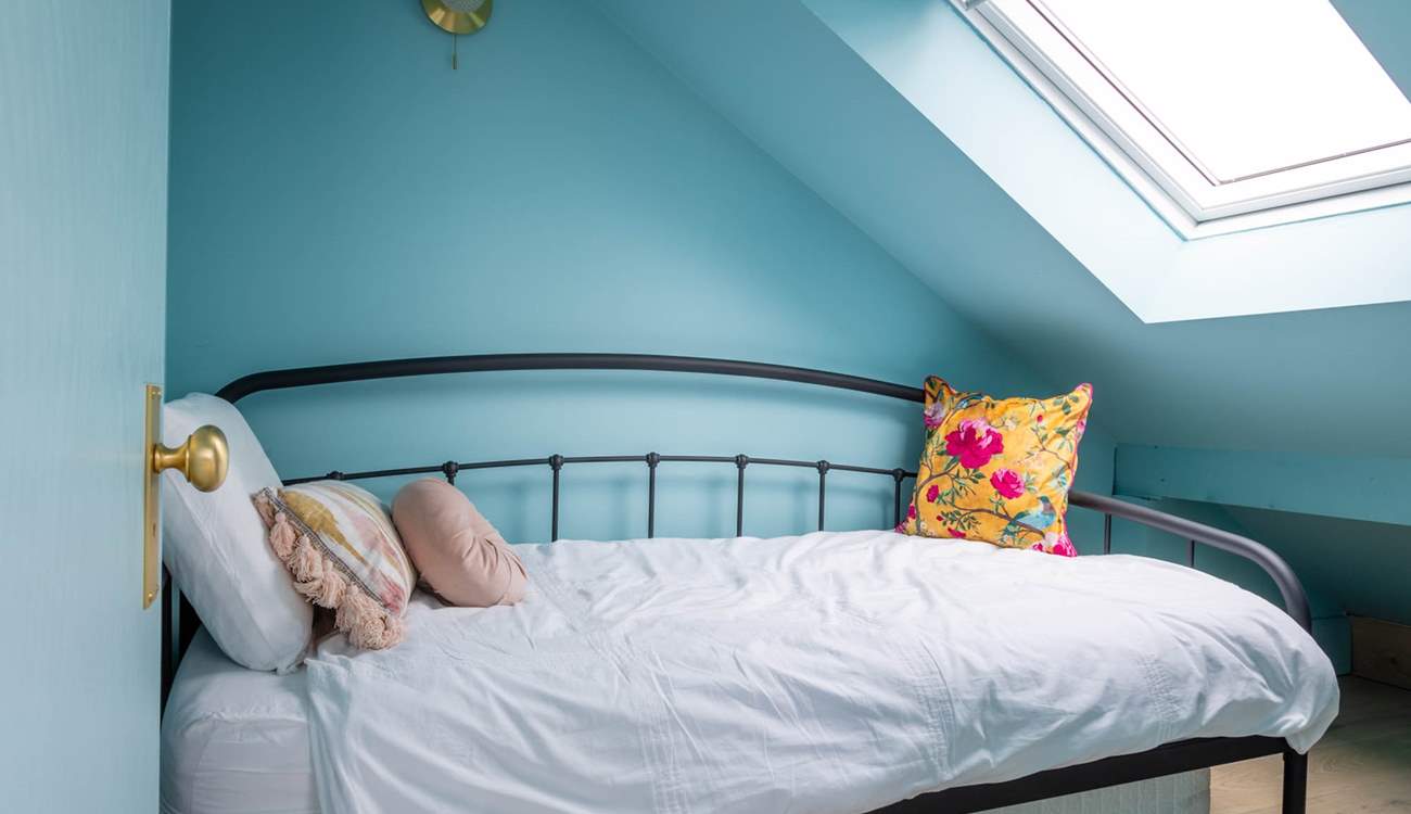 Bedroom 7 is accessed via bedroom 6 and is home to this cosy single bed.
