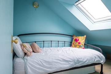 Bedroom Seven is accessed via Bedroom Six and is home to this cosy single bed.