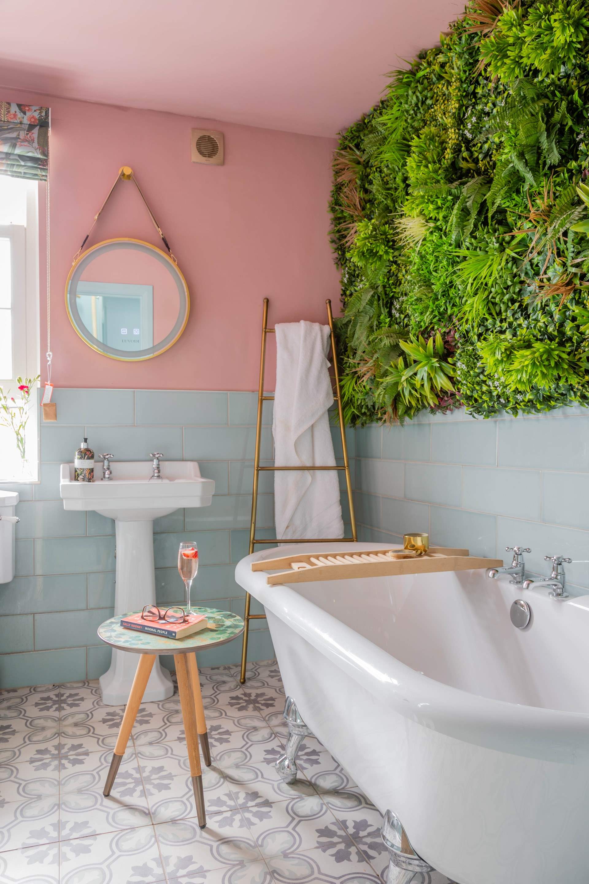 The family bathroom is home to this beautiful roll-top bath.