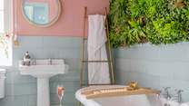 The family bathroom is home to this beautiful roll-top bath.